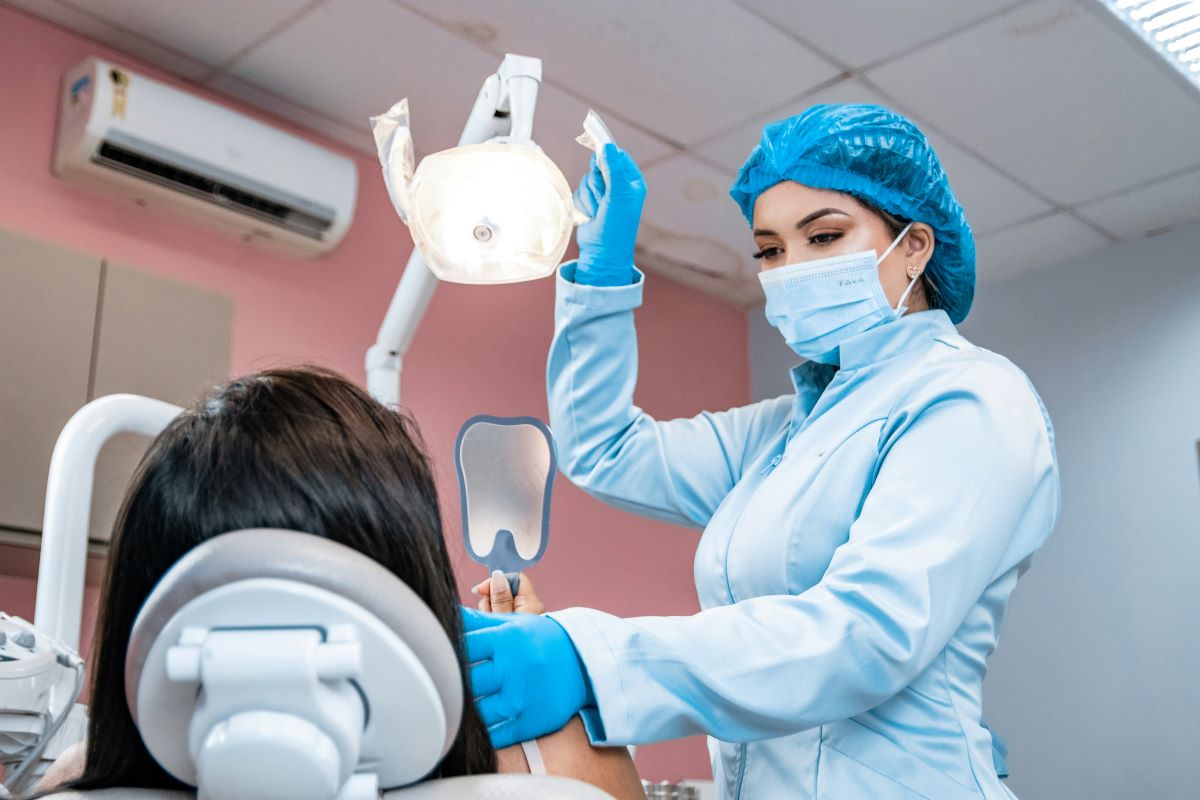 Dental assistant in dental office